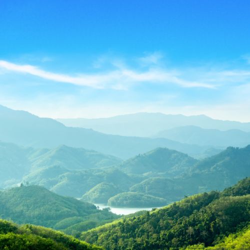 Vivid landscape with green hills and blue skies